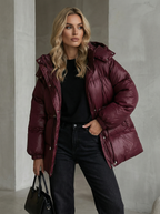 Warme gesteppte Winterjacke mit Kapuze