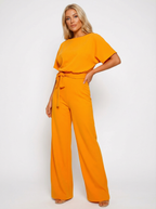 Fließender Overall mit Bindegürtel