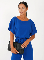 Fließender Overall mit Bindegürtel